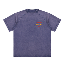 Load image into Gallery viewer, A washed navy blue short-sleeve raglan t-shirt with a small red and yellow 'LOCAL LO-CAL ART' graphic on the left chest, displayed flat against a white background.
